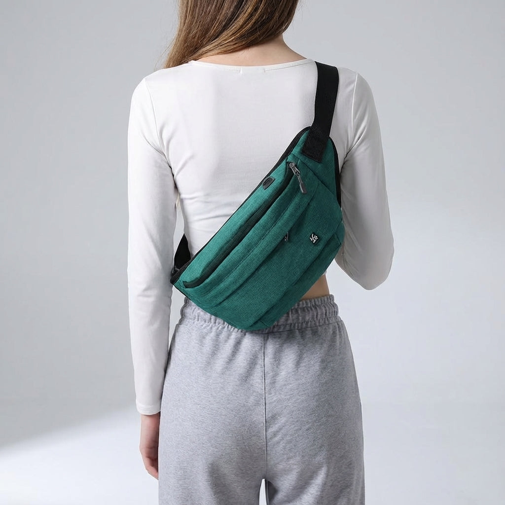 Praktische zwarte nylon slingtas met meerdere voorzakken, perfect voor snelle toegang.