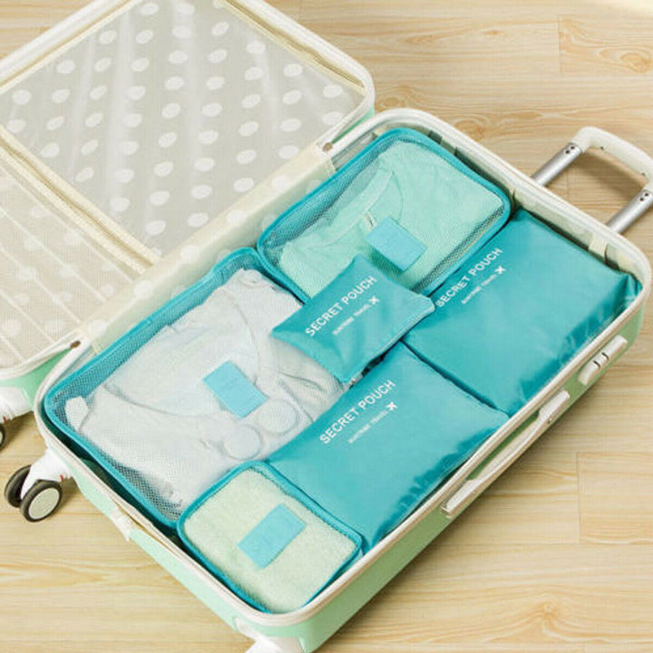 Veelzijdige set (12 stuks) van opbergtassen en organizers voor al je reisbenodigdheden en items.