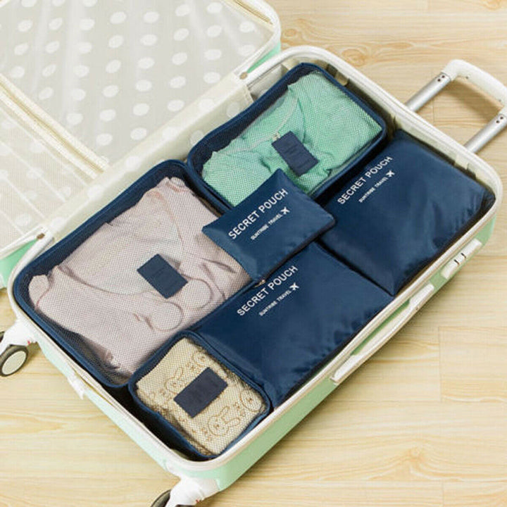 Ruimtebesparende reis organizer set, ideaal voor koffer en overzichtelijke opslag van kleding.