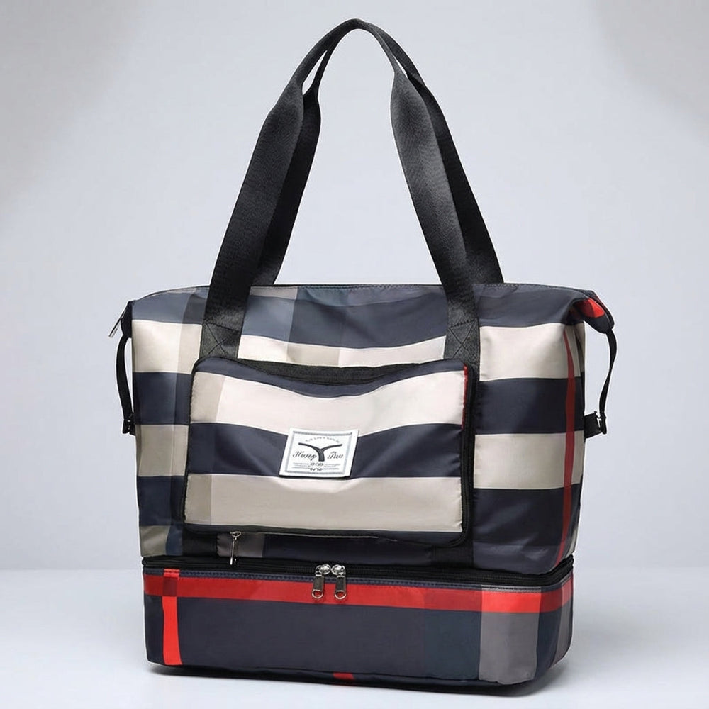 Detail van het handige bodemvak van de Bagloria weekendtas, perfect voor schoenen of natte spullen.
