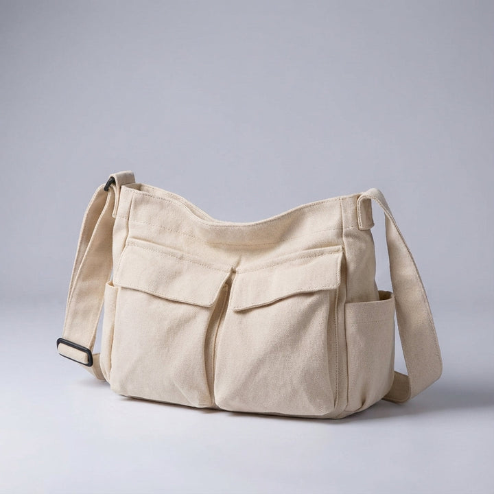 Stijlvolle unisex schoudertas Packlite, gemaakt van stevig canvas met verstelbare draagriem voor comfort.