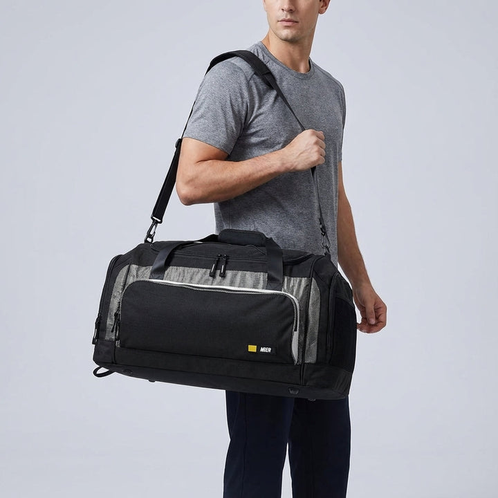 Lichte en ruime unisex reistas (60L) van TravelPort. Multifunctionele duffeltas met slimme vakken voor al je bagage.
