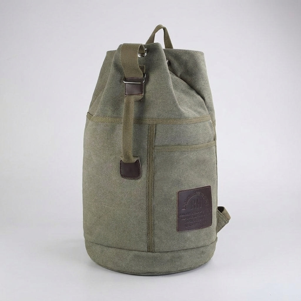 Khaki, zwarte, groene unisex stadsrugzak van Packhaven, stevig en ruim, ideaal voor werk of school met veel vakken.
