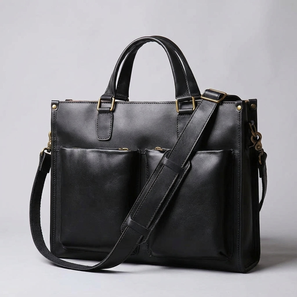 Elegante unisex vintage leren laptoptas, bruikbaar als aktetas of schoudertas; stijlvol en functioneel voor werk.