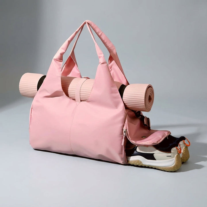 Unisex sporttas gedragen, perfect voor gym of reis. Waterafstotend en met handig schoenenvak.