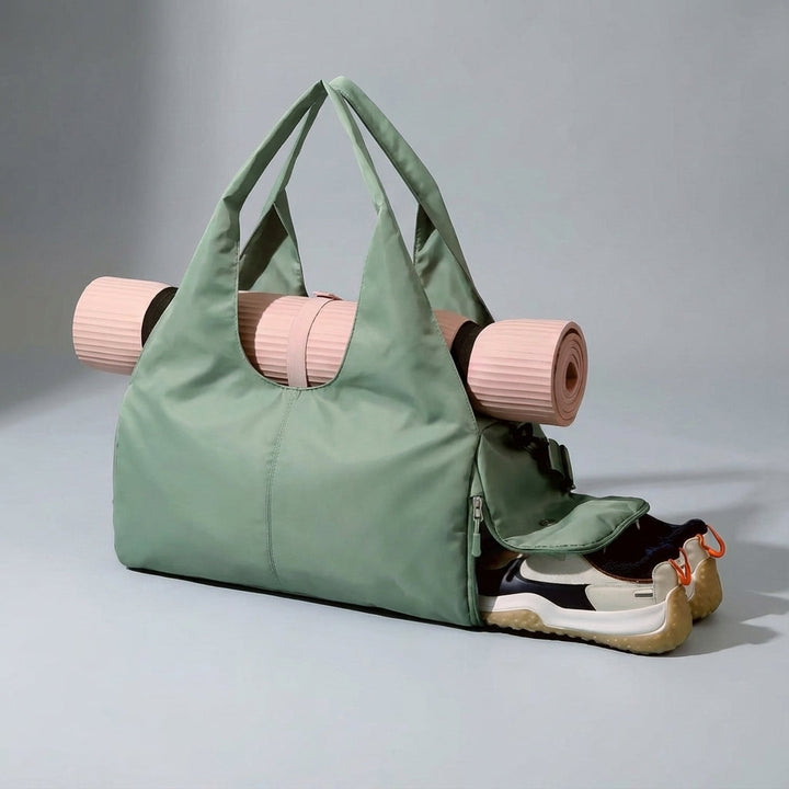 Compacte waterafstotende reistas/duffelbag met schoenenvak. Ideaal voor korte trips en sportieve uitjes.