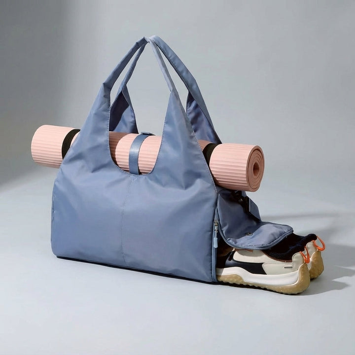 Close-up van het duurzame, waterafstotende materiaal van deze unisex sport- en reistas met schoenenvak.
