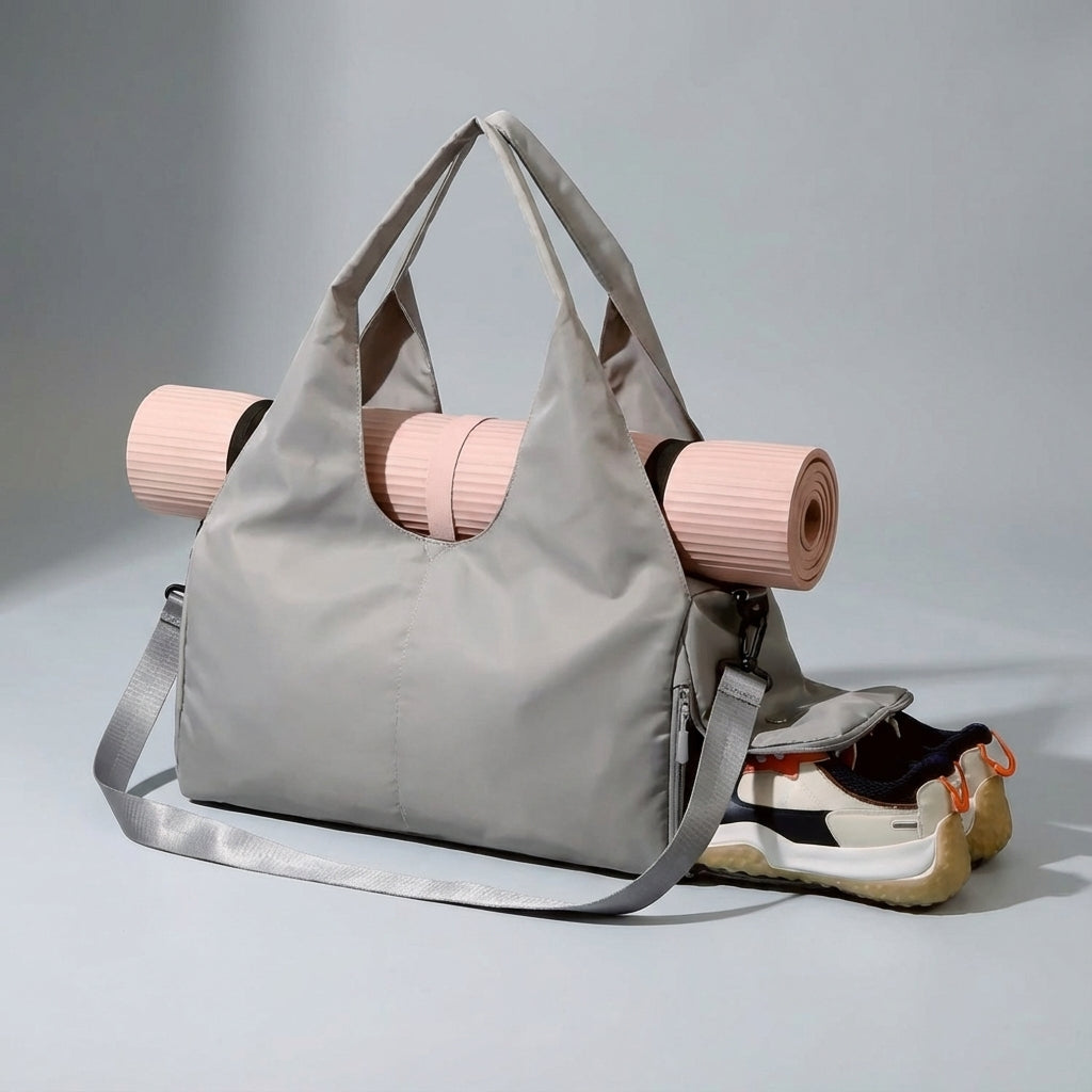 Stijlvolle zwarte unisex sporttas/duffelbag. Waterafstotend met apart schoenenvak voor gym of reis.