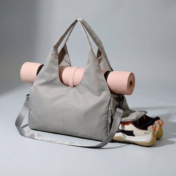 Stijlvolle zwarte unisex sporttas/duffelbag. Waterafstotend met apart schoenenvak voor gym of reis.