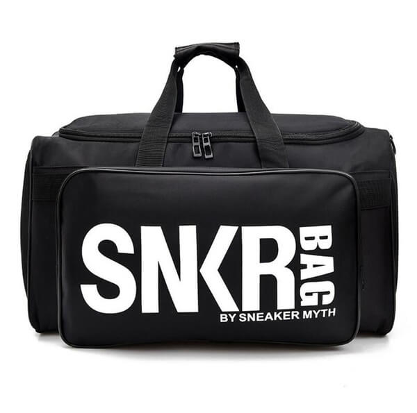 Georganiseerde waterdichte weekendtas met slimme vakkenindeling voor sneakers, kleding en accessoires.
