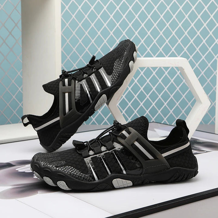 Veelzijdige unisex waterschoenen voor alle zomerse wateractiviteiten; strand, zwemmen, watersport. Sneldrogend & comfortabel.