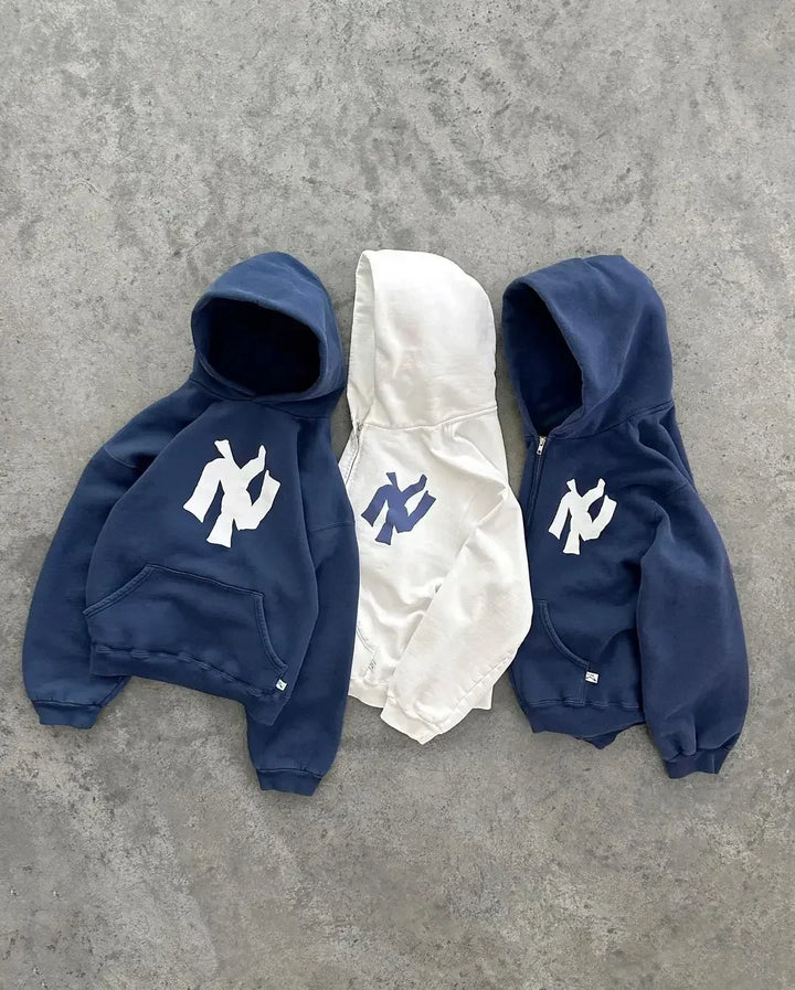 Unisex Y2K hoodie met abstracte kunstprint, oversized pasvorm voor streetwear mode en comfort.