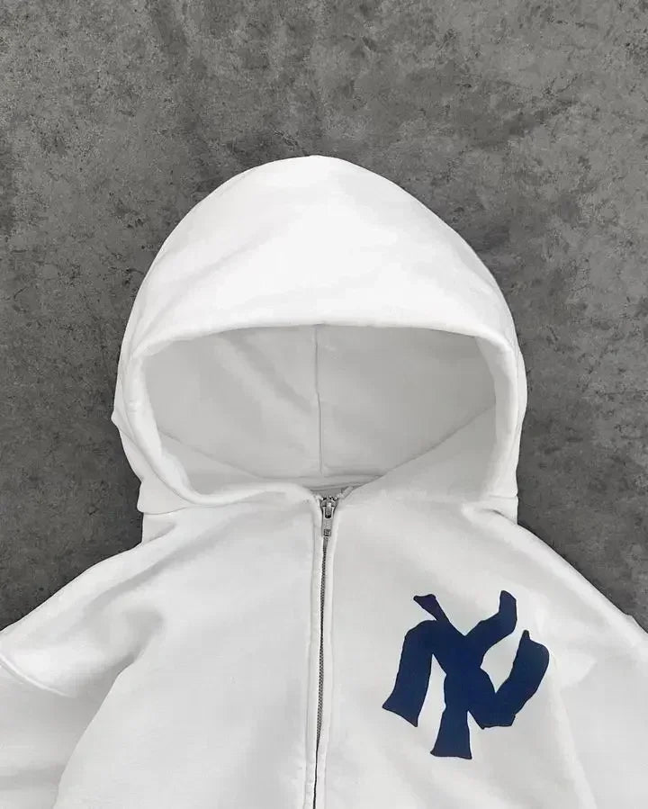 Trendy Y2K vest met abstracte kunst, unisex en relaxte pasvorm. Ideaal voor een comfortabele streetwear outfit.