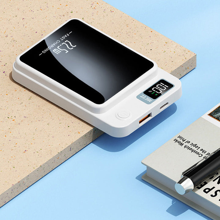 Compacte draadloze powerbank snellader, ideaal voor mobiel opladen onderweg of op reis.