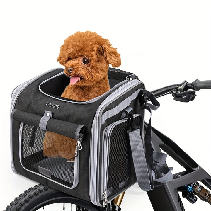 Veilige uitbreidbare fietsmand voor huisdieren met mesh-vensters, geschikt voor honden en katten tot 8 kg.