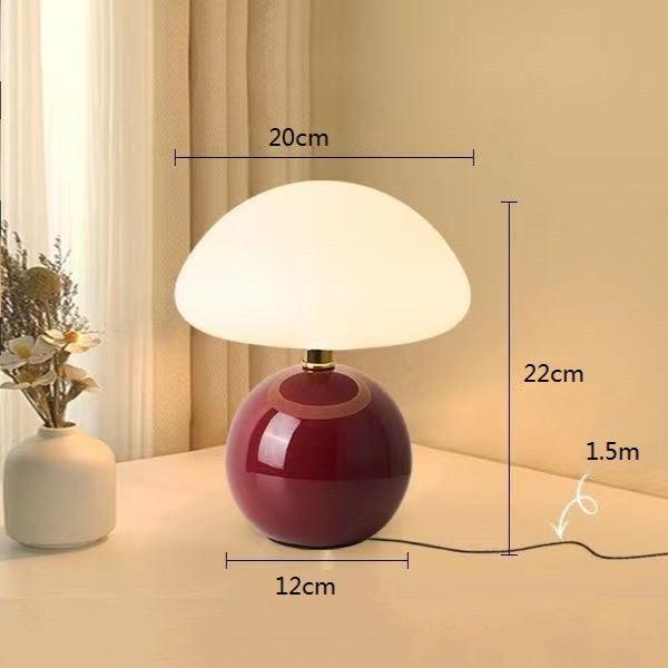 "Verstelbare LED paddenstoel lamp in modern design, keramiek en PVC, voor elegante sfeer in huis of kantoor."