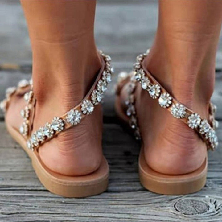 Verstelbare Nia dames sandalen, bruin, met anti-slip zool. Comfortabele slippers voor casual en elegante outfits.