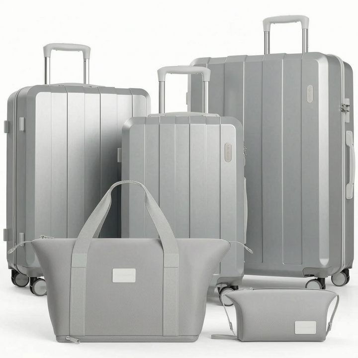 Meerkleurige 5-delige bagageset met hardcase trolleys; ideaal voor georganiseerde reizen en vakanties.