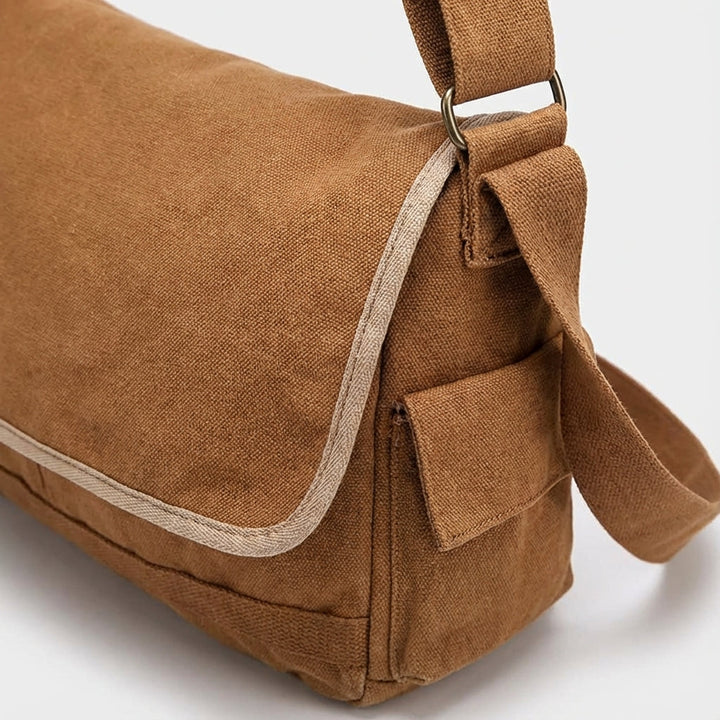 Ruime unisex vintage schoudertas van canvas, geschikt voor laptop en boeken, ideaal voor school en dagelijks werk.