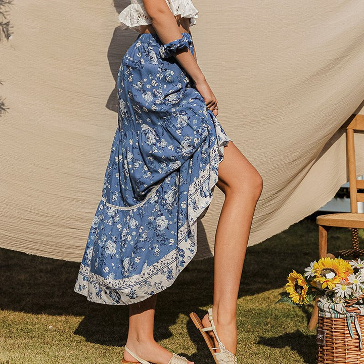 Elegante dames zomerrok met bloemenprint en comfortabele hoge taille. Deze vloeiende midi rok is modieus en veelzijdig.