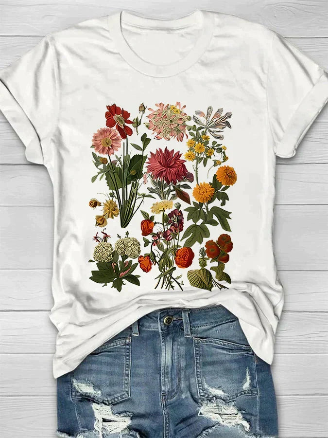 Comfortabel vrouwenshirt met korte mouwen, ronde hals & chique bloemenprint. Veelzijdige damesmode.
