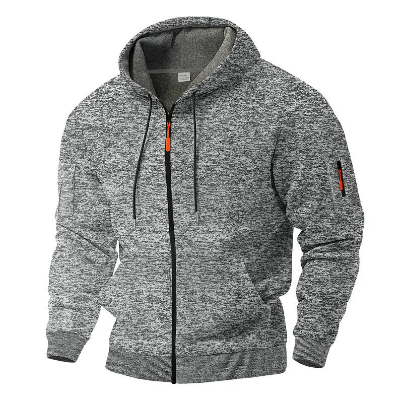 Robuust heren outdoorvest met capuchon en rits. Biedt warmte & stijl voor avontuurlijke en casual momenten.