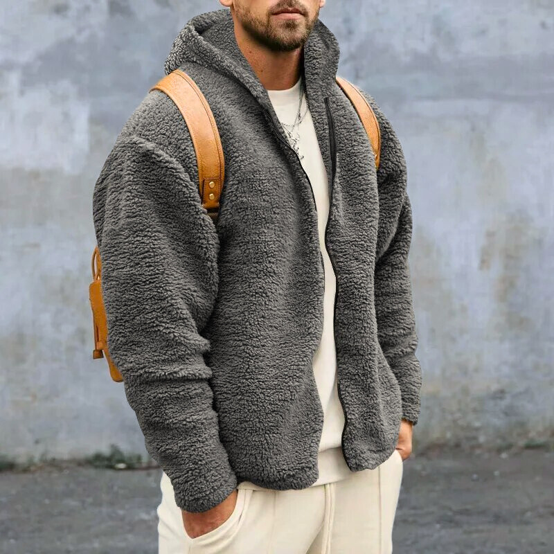 Marineblauw heren capuchonvest met rits, warm en comfortabel voor casual winterse momenten.