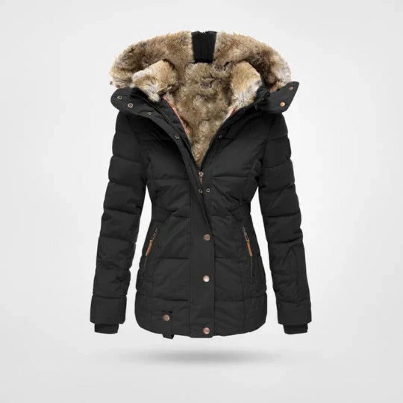 Warme dames winterjas met gevoerde capuchon, dubbele sluiting en trendy design. Perfecte buitenjas voor wintermode.