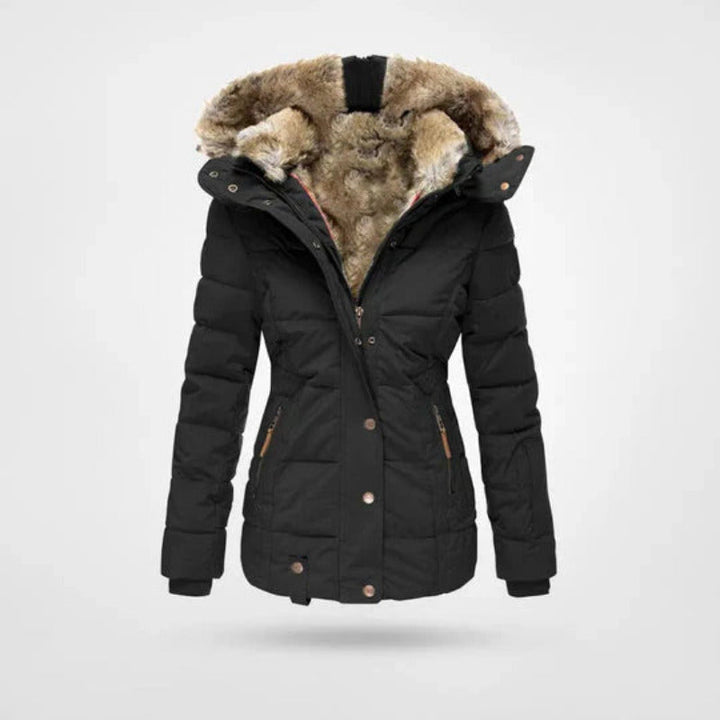 Warme dames winterjas met gevoerde capuchon, dubbele sluiting en trendy design. Perfecte buitenjas voor wintermode.