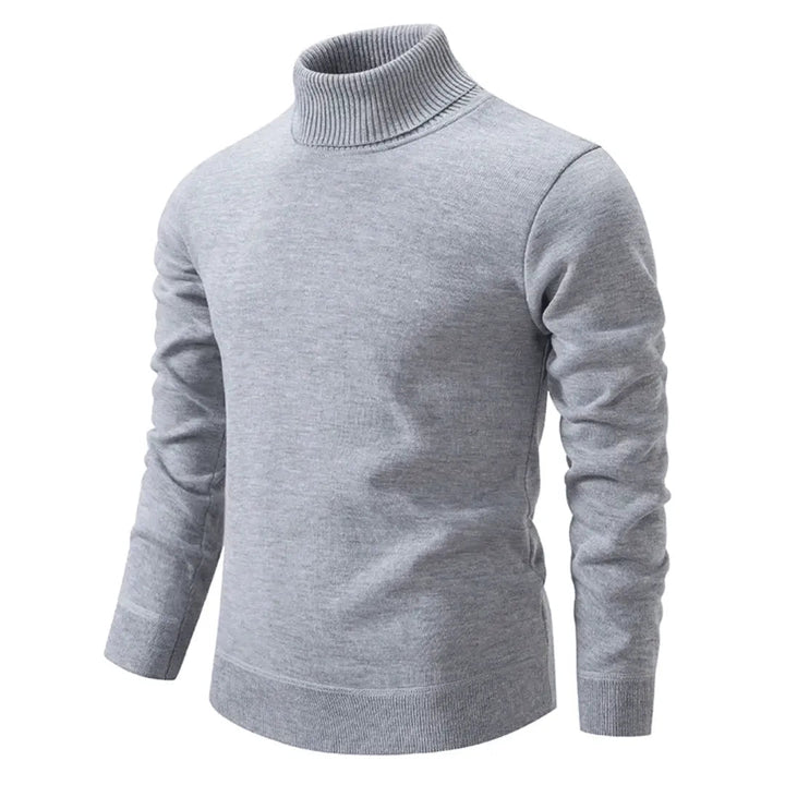 Comfortabele warme heren coltrui met hoge kraag. Essentiële casual trui voor de koude herfst- en winterdagen.