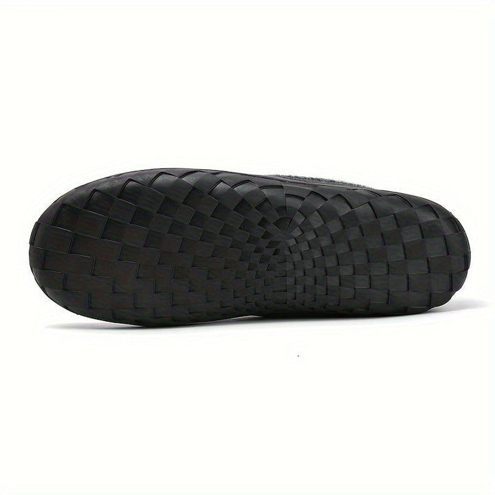 Detail van zachte voering in warme heren loafers pantoffels, voor optimaal comfort.
