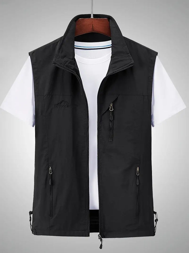 "Waterdicht heren vest, mouwloos, met rits. Ideaal voor regenachtige dagen. Blauw, groen, zwart opties. Comfortabel en stijlv