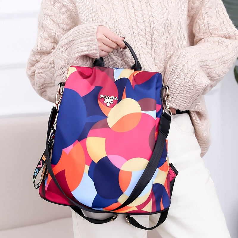 Robuuste waterdichte dames rugzak met meerdere compartimenten, duurzaam nylon/PU leer materiaal.