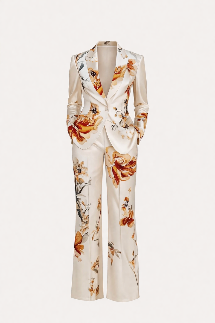 Zomerse dames blazer en broek met bloemenprint, een chique tweedelige set voor een elegante dameskledingstijl.