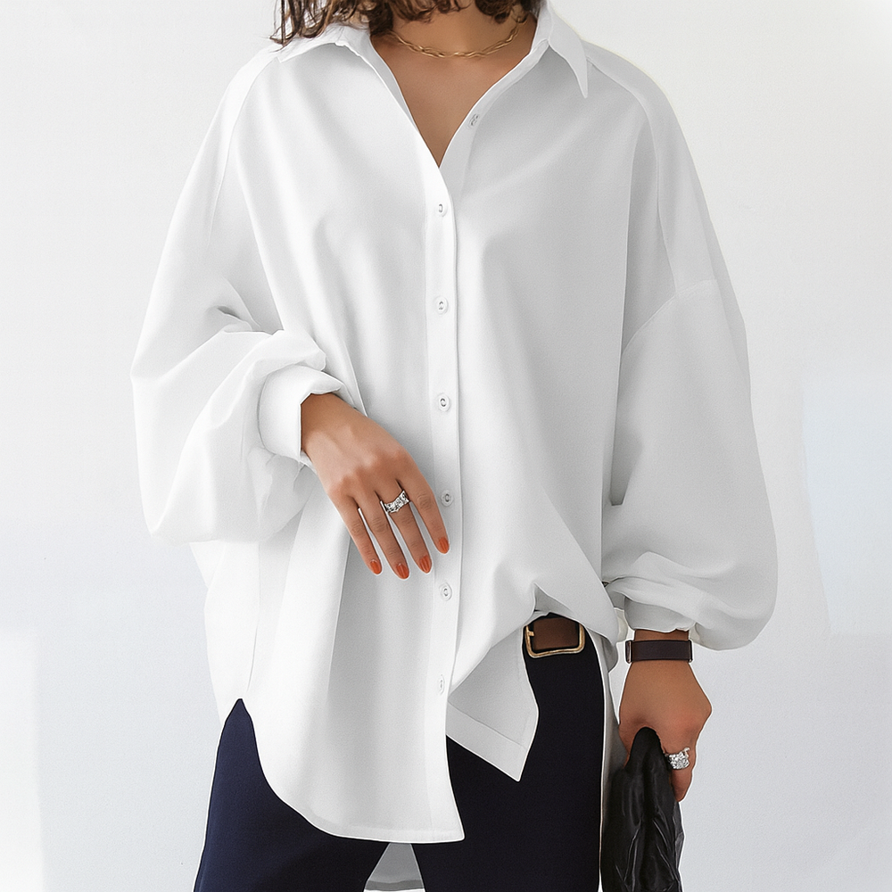 Khaki oversized dames blouse, comfortabel en veelzijdig met trendy ballonmouwen; perfect voor casual of elegante outfits.