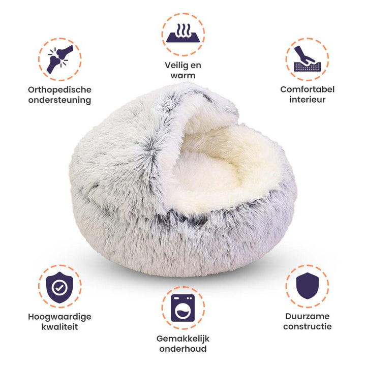 Warm en knus grottenbed voor honden, de Cozycave vermindert angst en zorgt voor diepe ontspanning.