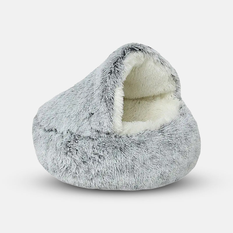 Diepe slaap gegarandeerd met het pluche Cozycave grottenbed, een kalmerend toevluchtsoord voor honden.