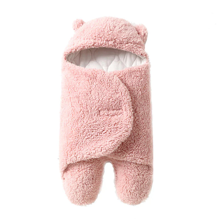 "Zachte baby wikkel deken in pasteltinten, houdt je baby warm en knus in de winter, gemaakt van huidvriendelijk materiaal."