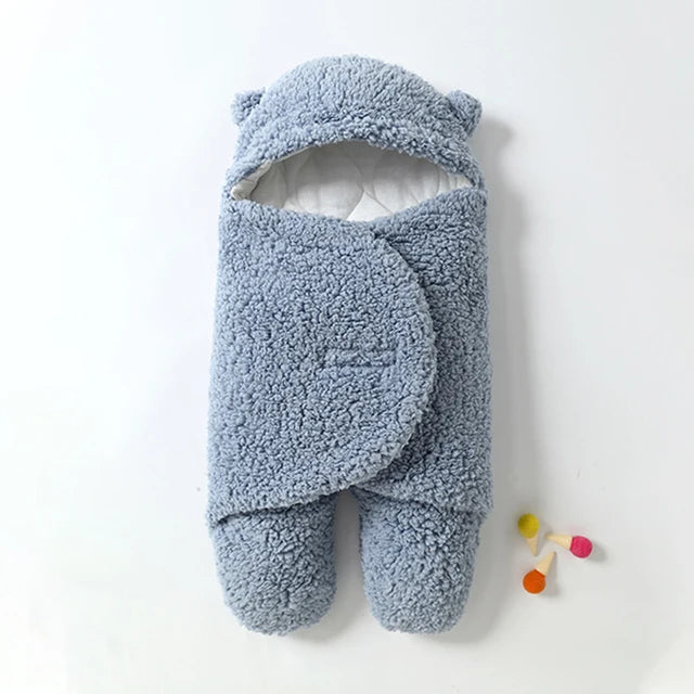 Zachte baby wikkeldeken voor knus comfort; ideaal voor pasgeborenen en warme dutjes.
