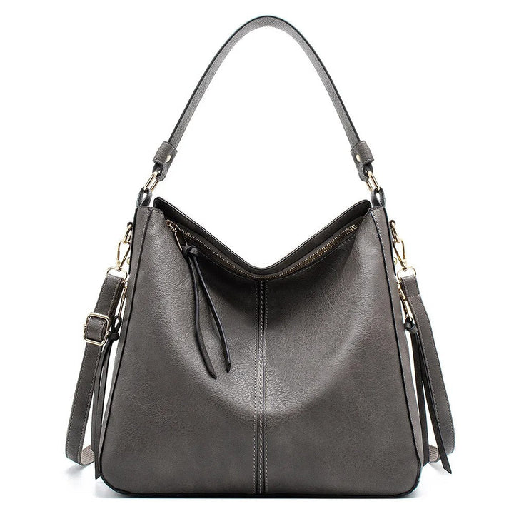 Compacte luxe leren crossbody tas voor dames, praktisch en elegant voor onderweg.