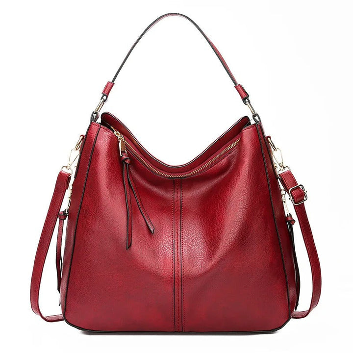 Modieuze dames schoudertas van zacht leer, perfect als veelzijdige crossbody handtas.