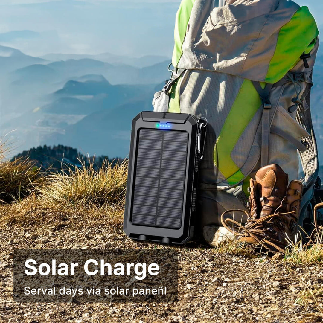 Zonne-powerbank 20000 mAh naast smartphone, toont opladen functionaliteit en compact formaat.