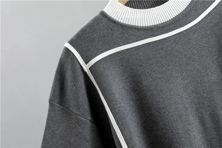 Stijlvol zwart dames trainingspak met hoodie en broek. Modern en comfortabel voor winter of vrije tijd.