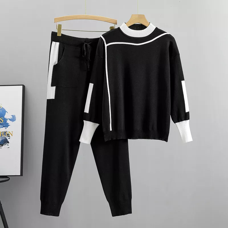 Modern bordeauxrood damespak, perfect als winterkleding of vrijetijdskleding. Comfortabele tweedelige set.