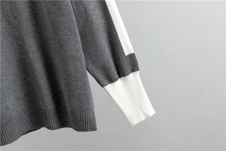 Grijs sportief damespak. Dit comfortabele tweedelige trainingspak is perfect voor een actieve lifestyle.