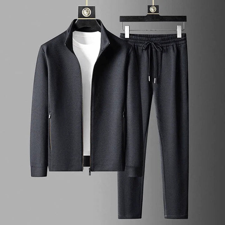 Stijlvol blauw heren trainingspak, ideaal voor vrijetijdskleding en casual gebruik. Comfortabele heren outfit.