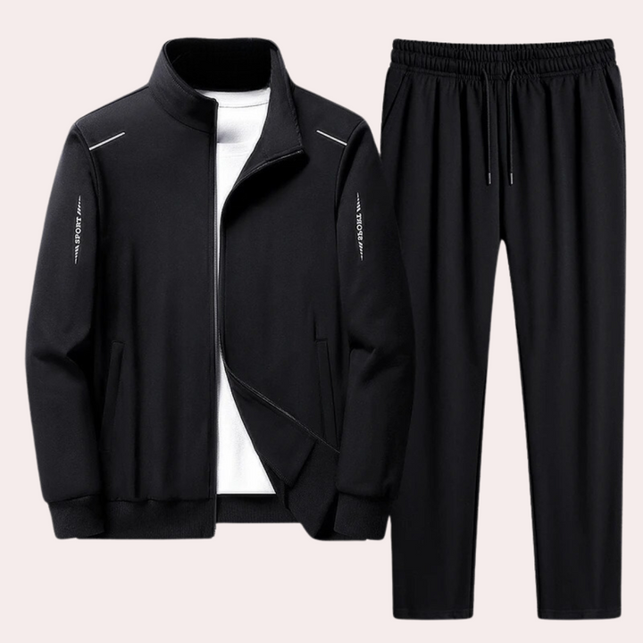 "Zwart heren trainingspak met jas, opstaande kraag en elastische tailleband voor ultiem comfort en stijlvol design."