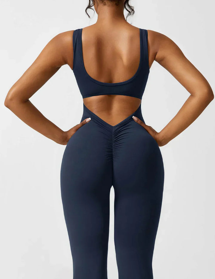 Olijfkleurige comfortabele shaping jumpsuit voor dames met flared pijpen.
