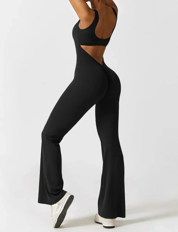 Donkerblauwe modieuze jumpsuit met V-rug en shaping effect.