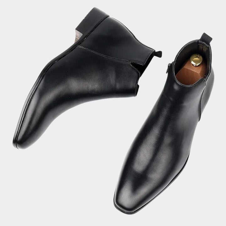 Tijdloze bruine chelsea boots met rits voor heren, stijlvol en veelzijdig in gebruik.